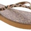 Juicy Couture Selfless Women’s Thong Sandal -Shoe Sensation Shop juicycouture selfless nat selflessnaturalmulti brown01